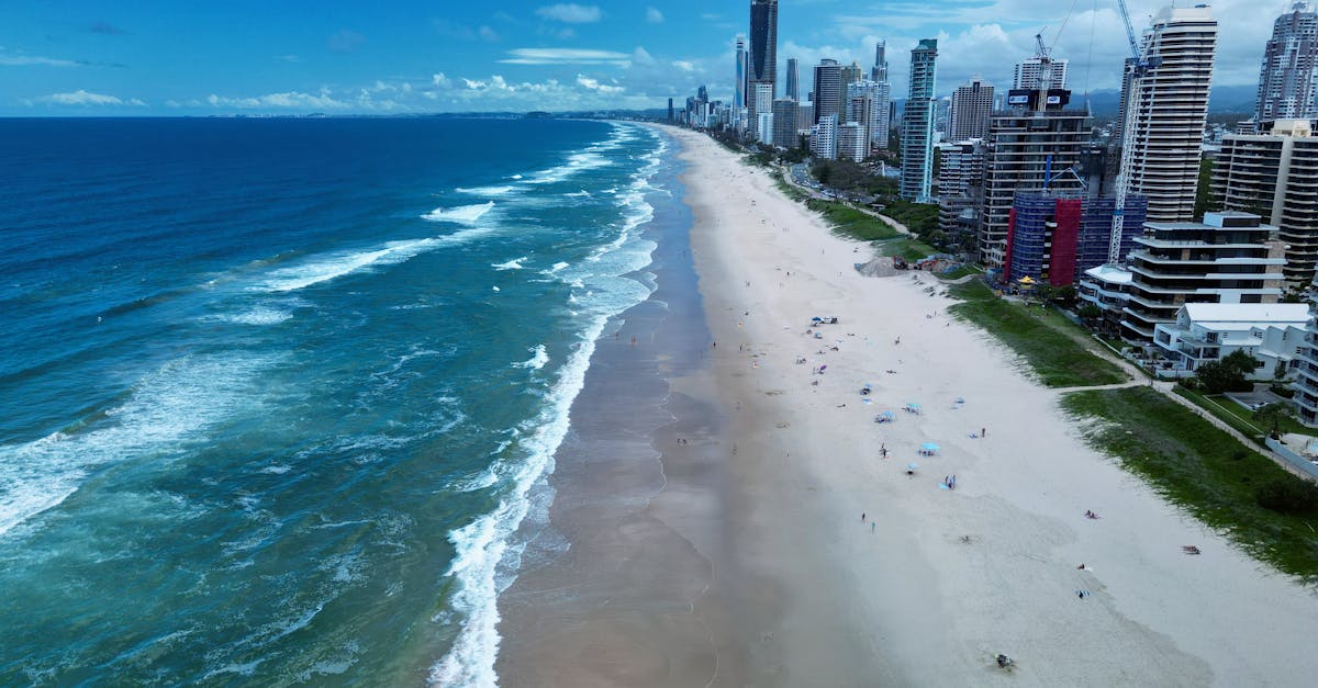 Aerial view of Gold Coast beach meeting the modern skyline